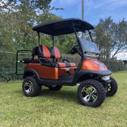 Orange 2018 Lifted Club Car Precedent Golf Cart