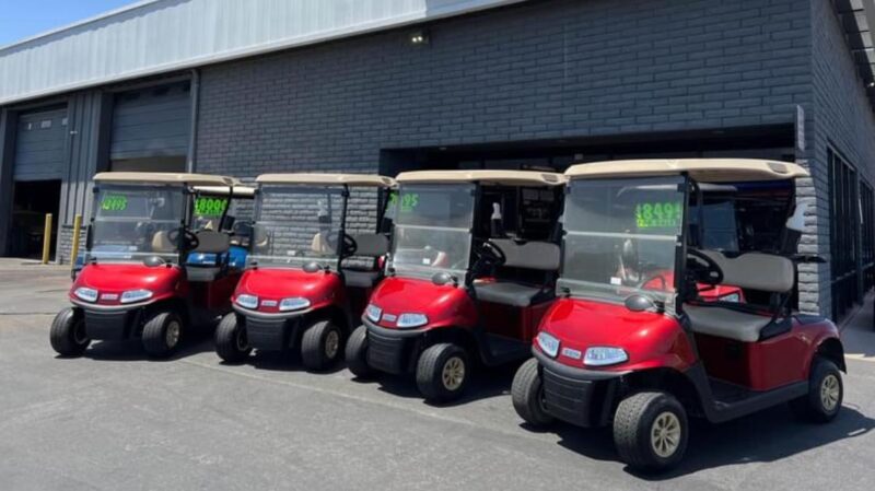 Lot of (4) 2022 EZGO RXV 2 Passenger Golf Carts in Red with Lithium Batteries.